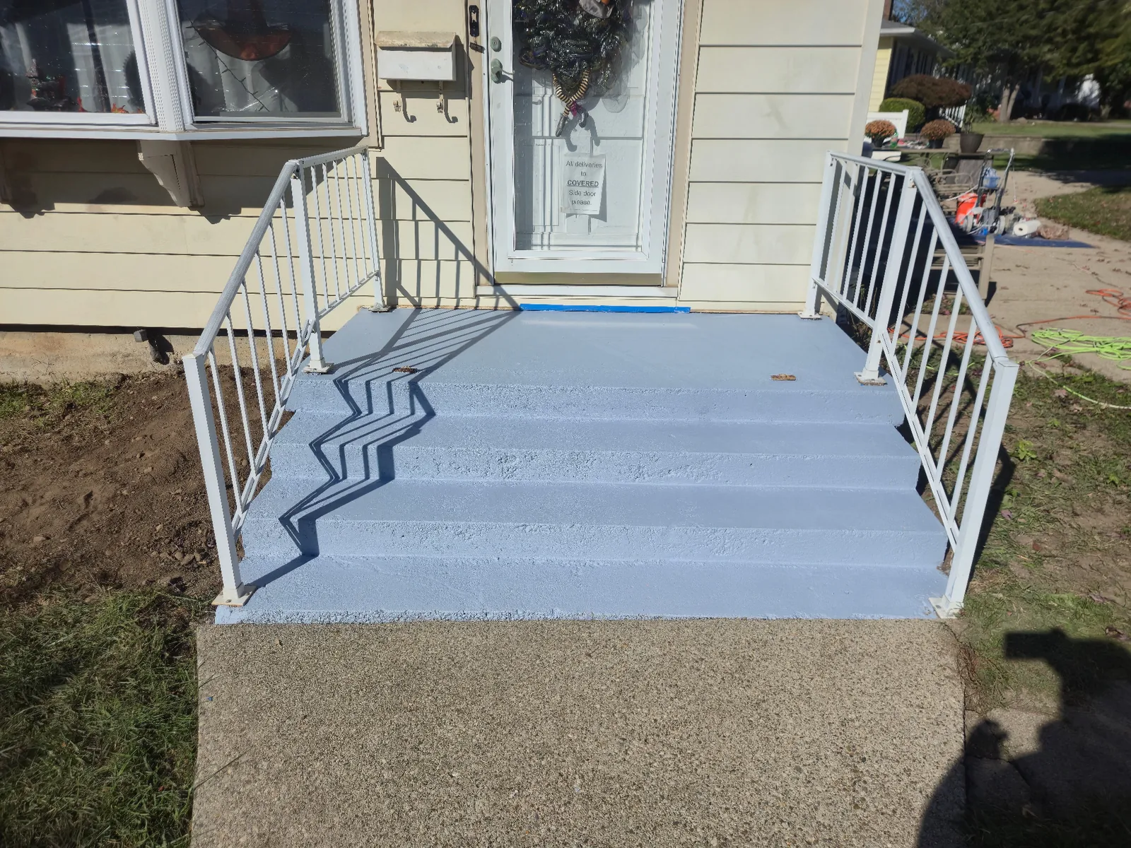 Rebecca project concrete entrance stairs after crack sealing and stair enamel